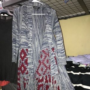 Long cardigan with fringe at the bottom